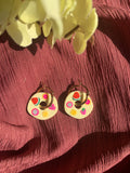 Boucles d'oreilles Fruitella - bijou sur fond bordeaux